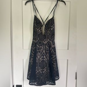 Navy blue embroidered mini dress. Perfect guest wedding dress for summer.